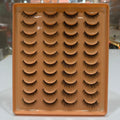 Set of 20_Pairs_Party_Lashes on an orange tray with a blurred background