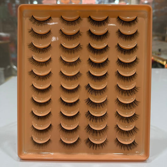 Set of 20_Pairs_Party_Lashes on an orange tray with a blurred background