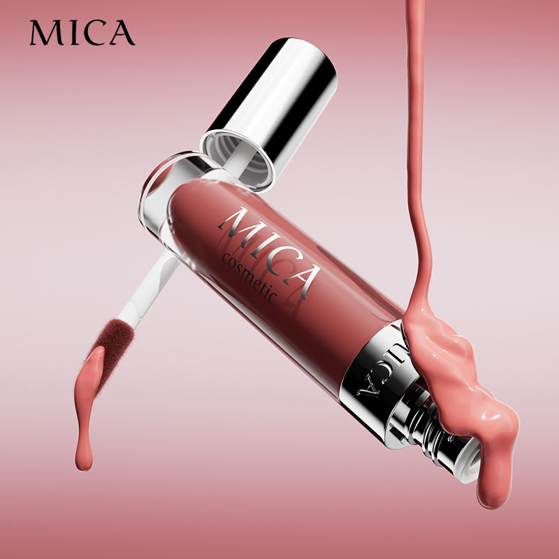 Lip gloss with MICA Cosmetics branding on a pink background