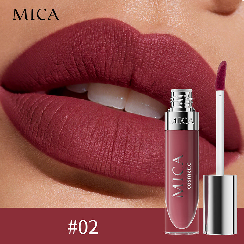 Lipstick with MICA cosmetic branding on a close-up of lips wearing the color.