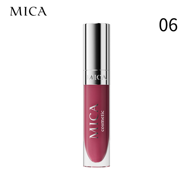 Lipstick with silver cap and red shade on a white background, featuring the brand 'MICA'.
