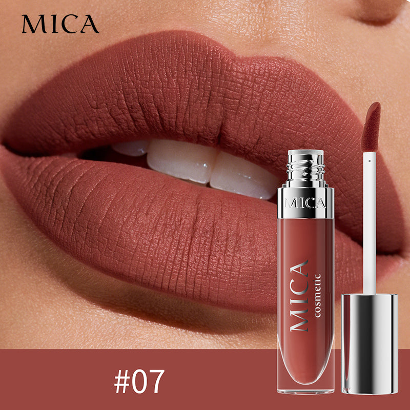 Lipstick with MICA branding on a close-up of lips wearing the color.