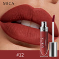 MICA cosmetic lipstick with applicator on a close-up of lips